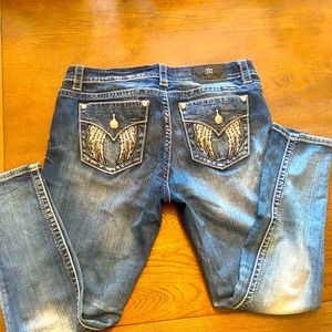 Miss Me mid-rise easy skinny, wing back pockets